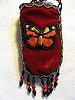 Dark red cell ph. holder w/ orange butterfly